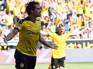 Dortmund remain unbeaten with Hertha win