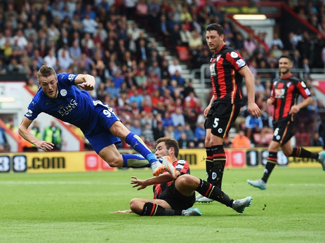 Steve Cook of Bournemouth fouls Jamie Vardy of Leicester City resulting in a penalty during the Barclays Premier League match between A.F.C. Bournemouth and Leicester City at Vitality Stadium on August 29, 2015