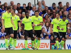 Kazenga Lualua of Brighton celebrates his opening goal with Tomer Hemed of Brighton during the Sky Bet Championship match between Ipswich Town and Brighton and Hove Albion at Portman Road stadium on August 29, 2015