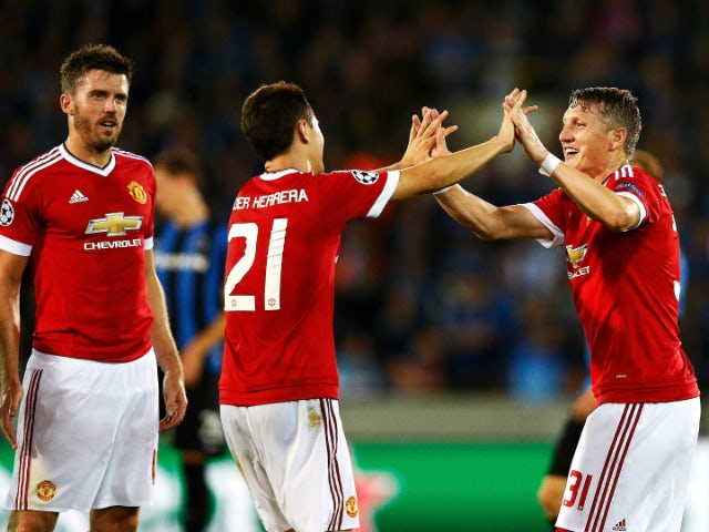 Ander Herrera of Manchester United celebrates scoring his team's fourth goal with Bastian Schweinsteiger of Manchester United during the UEFA Champions League qualifying round play off 2nd leg match between Club Brugge and Manchester United held at Jan Br