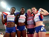 Christine Ohuruogu of Great Britain, Anyika Onuora of Great Britain, Eilidh Child of Great Britain and Seren Bundy-Davies of Great Britain celebrate after winning bronze in the Women's 4x400 Relay Final during day nine of the 15th IAAF World Athletics Cha