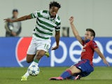 CSKA Moscow's midfielder from Serbia Zoran Tosic (R) vies with Sporting's midfielder Andre Carrillo (L) during the UEFA Champions League play-offs, second leg football match between CSKA Moscow and Sporting CP, at the Khimki Arena outside Moscow on August