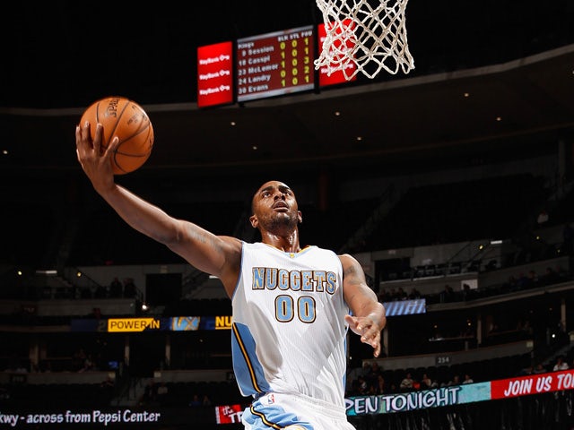 Darrell Arthur #00 of the Denver Nuggets lays up a shot against the Sacramento Kings at Pepsi Center on November 3, 2014