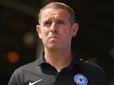 Peterborough United manager Dave Robertson looks on during the pre season friendly match between Peterborough United and a Tottenham Hotspur XI at London Road Stadium on July 18, 2015