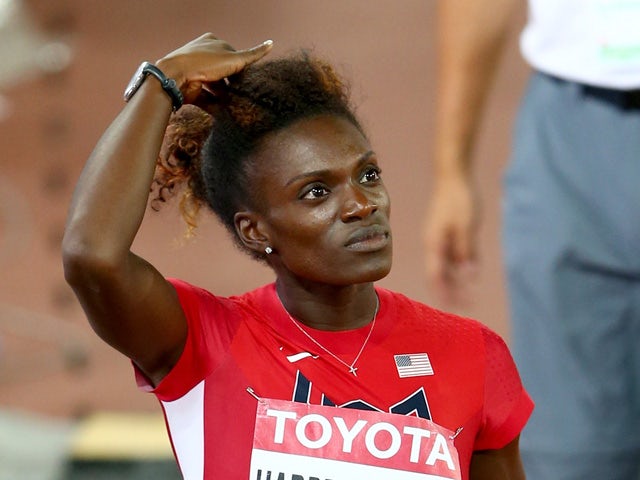 Dawn Harper Nelson of the United States reacts after falling during the Women's 100 metres hurdles semi-final during day seven of the 15th IAAF World Athletics Championships Beijing 2015 at Beijing National Stadium on August 28, 2015