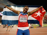 Cuba's Denia Caballero celebrates her discus triumph at the World Championships on August 25, 2015