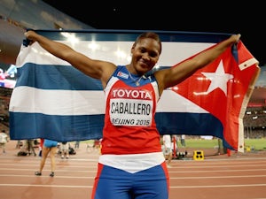Cuba's Denia Caballero celebrates her discus triumph at the World Championships on August 25, 2015
