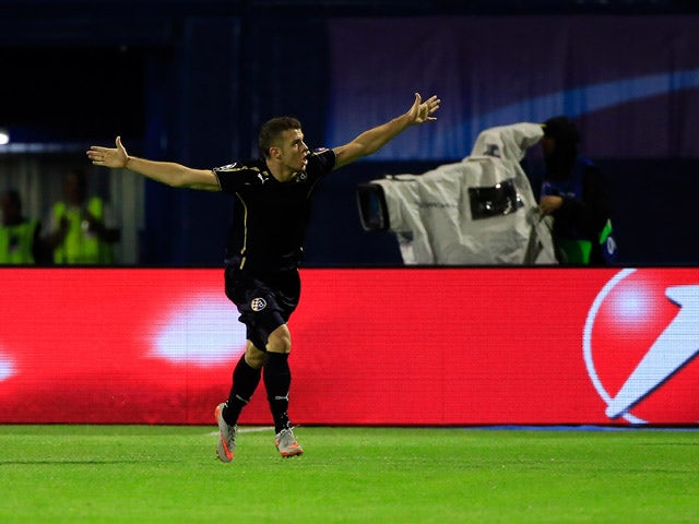 Armin Hodzic of Dinamo Zagreb celebrates scoring their second goal during the UEFA Champions League Qualifying Round Play Off Second Leg match between Dinamo Zagreb and FC Skenderbeu at Maksimir stadium in Zagreb, Croatia on Tuesday, August 25, 2015