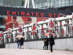 Fans begin to arrive at a rainy Emirates ahead of Arsenal's clash with Liverpool on August 24, 2015