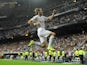 Real Madrid's Welsh forward Gareth Bale celebrates after scoring his second goal during the Spanish league football match Real Madrid CF vs Real Betis Balompie at the Santiago Bernabeu stadium in Madrid on August 29, 2015