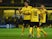 Dortmund's Henrikh Mkhitaryan, Mats Hummels and Julian Weigl celebrate during the UEFA Europa League second-leg play-off match between Borussia Dortmund and Odds BK in Dortmund on August 28, 2015