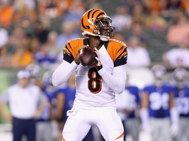 Josh Johnson #8 of the Cincinnati Bengals prepares to pass the ball against the New York Giants during an preseason game at Paul Brown Stadium on August 14, 2015
