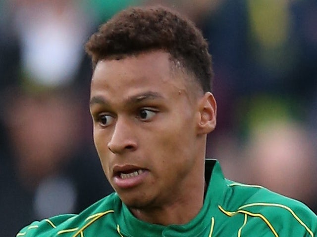 Josh Murphy of Norwich City runs with the ball during the pre season friendly match between Hitchin Town and Norwich City at Top Field Stadium on July 14, 2015