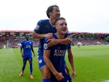 Jamie Vardy of Leicester City celebrates scoring his team's first goal with his team mate Shinji Okazaki during the Barclays Premier League match between A.F.C. Bournemouth and Leicester City at Vitality Stadium on August 29, 2015