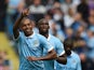 Manchester City's Brazilian midfielder Fernandinho (L) celebrates after scoring his team's second goal during the English Premier League football match between Manchester City and Watford at The Etihad Stadium in Manchester, north west England on August 2
