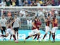 Roma's midfielder from Bosnia-Herzegovina Miralem Pjanic (2ndR) celebrates with teammates after scoring during the Italian Serie A football match AS Roma vs Juventus on August 30, 2015