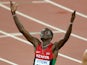 Nicholas Bett raises his hands to the sky after winning gold for Kenya in the men's 400m hurdles at the World Championships on August 25, 2015
