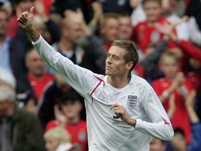 Peter Crouch of England gives a thumbs up after scoring his team's fifth goal during the Euro 2008 Qualifying match between England and Andorra at Old Trafford on September 2, 2006