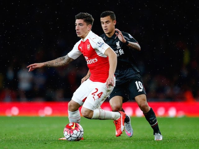 Liverpool's Philippe Coutinho chases Hector Bellerin of Arsenal on August 24, 2015
