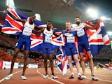 Rabah Yousif of Great Britain, Delanno Williams of Great Britain, Jarryd Dunn of Great Britain and Martyn Rooney of Great Britain celebrate after winning bronze in the Men's 4x400 Metres Relay final during day nine of the 15th IAAF World Athletics Champio