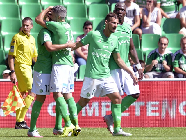 Saint-Etienne's players celebrates after scoring a goal during the French L1 football match between Saint-Etienne (ASSE) and Bastia (SCB) on August 30, 2015