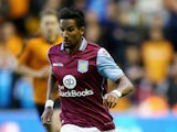Scott Sinclair of Aston Villa runs with the ball during the pre season friendly between Wolverhampton Wanderers and Aston Villa at Molineux on July 28, 2015