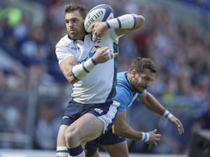 Scotlands Sean Lamont scores during the Scotland v Italy International Rugby match at Murrayfield Stadium on August 29, 2015