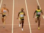 Shelly-Ann Fraser-Pryce of Jamaica beats Dafne Schippers of the Netherlands (L) and Veronica Campbell-Brown of Jamaica to win gold in the Women's 100 metres final during day three of the 15th IAAF World Athletics Championships Beijing 2015 at Beijing Nati