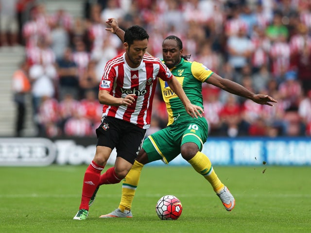 Maya Yoshida of Southampton is closed down by Cameron Jerome of Norwich City during the Barclays Premier League match between Southampton and Norwich City at St Mary's Stadium on August 30, 2015