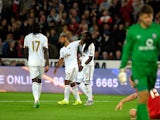  Swansea player Marvin Emnes is congratulated after scoring the third goal during the Capital One Cup Second Round match between Swansea City and York City at Liberty Stadium on August 25, 2015