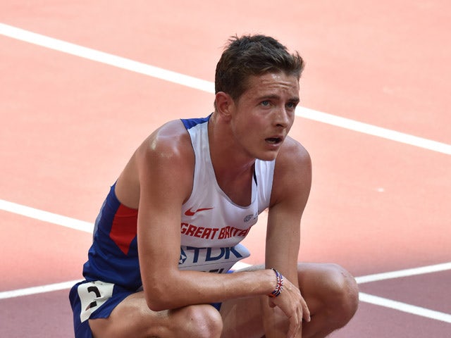 Britain's Tom Farrell reacts after competing in the men's 5000 metres athletics event at the 2015 IAAF World Championships at the 'Bird's Nest' National Stadium in Beijing on August 26, 2015