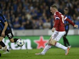 Manchester's Wayne Rooney scores the opening goal during the UEFA Champions League play-off round second leg football match between Club Brugge and Manchester United at Jan Breydel stadium in Bruges, Belgium on August 26, 2015
