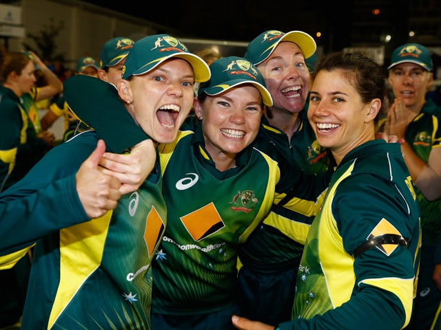 Australia players celebrate their win over England during the 2nd NatWest T20 of the Women's Ashes Series between England and Australia Women at BrightonandHoveJobs.com County Ground on August 28, 2015