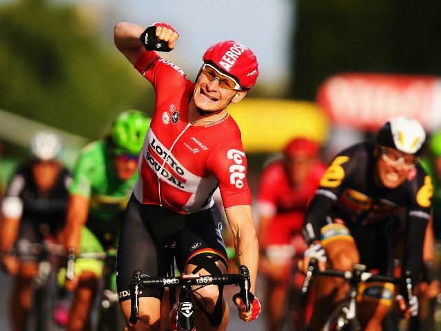 Andre Greipel of Germany and Lotto-Soudal celebrates as he crosses the finish line to win the twenty first stage of the 2015 Tour de France, a 109.5 km stage between Sevres and Paris Champs-Elysees, on July 26, 2015 in Paris, France.