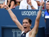 Andrea Petkovic of Germany celebrates match point against Caroline Garcia of France during their 2015 US Open Women's singles round 1 match at the USTA Billie Jean King National Tennis Center September1, 2015 in New York. AFP PHOTO / TIMOTHY A. CLARY