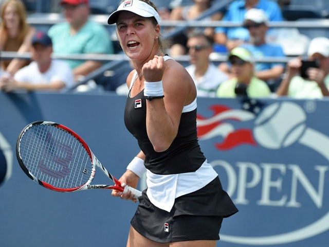 Anna Tatishvili of the US reacts winning a point against Karolina Pliskova of Czech Republic during their Womens Singles round 1 match of the US Open at USTA Billie Jean King National Tennis Center in New York on August 31, 2015