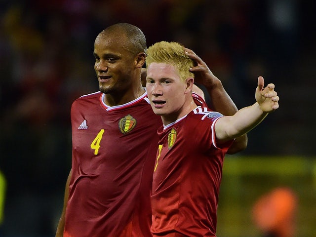 Belgium's Kevin De Bruyne celebrates after scoring with Belgium's Vincent Kompany during the Euro 2016 qualifying match between Belgium and Bosnia and Herzegovina at the King Baudouin Stadium in Brussels, on September 3, 2015