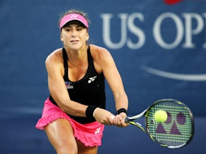 Bencic storms into second round