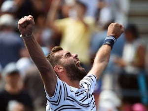 France's Benoit Paire celebrates defeating Japan's Kei Nishikori during their Mens Singles round 1 match of the US Open at USTA Billie Jean King National Tennis Center in New York on August 31, 2015