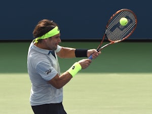 Ferrer loses to Mahut in second round