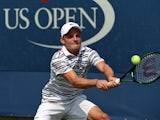 David Goffin of Belguim hits shot against Ricardas Berankis of Lithuania during their 2015 US Open Men's singles round two match at the USTA Billie Jean King National Tennis Center September 2, 2015 in New York. AFP PHOTO / TIMOTHY A. CLARY (Photo credit 