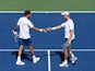 Dominic Inglot of Great Britain and Robert Lindstedt of Sweden play against Tommy Haas of Germany and Radek Stepanek of the Czech Republic during their Men's Doubles Third Round match on Day Seven of the 2015 US Open.