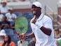 Donald Young of the US reacts to winning a point against Gilles Simon of France during their Men's Singles round 1 match at the US Open at USTA Billie Jean King National Tennis Center in New York on September 1, 2015