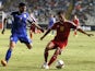 Belgium's Eden Hazard (R) dribbles the ball as Cyprus' Georgios Economides defends during their EURO 2016 qualifying football match between Cyprus and Belgium at the Neo GSP stadium in the Cypriot capital, Nicosia, on September 6, 2015.