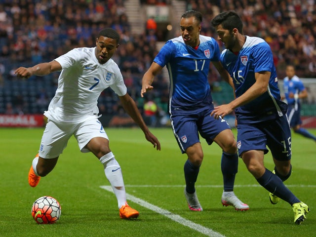  Jordan Ibe of England takes on Jerome Kiesewetter of USA, centre, and Eric Miller of USA, right, during the International friendly match between England U21 and USA U23 at Deepdale on September 3, 2015 
