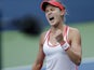 Eugenie Bouchard of Canada reacts as she scores a point against to Polona Hercog of Slovenia during their 2015 US Open Women's Singles round 2 match at the USTA Billie Jean King National Tennis Center September 2, 2015