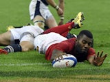 France's winger Noa Nakaitaci scores a try during the rugby union test match between France and Scotland at the Stade de France in Saint-Denis, north of Paris, on August 5, 2015.