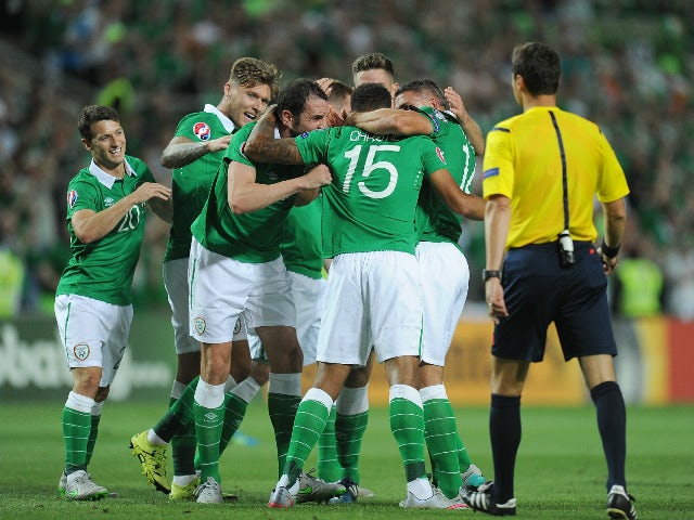 Cyrus Christie of Republic of Ireland celebrates with teammates after scoring Ireland's 1st goal during the UEFA EURO 2016 Qualifier between Gibraltar and Republic of Ireland at Estadio Algarve on September 4, 2015 in Faro, Portugal.