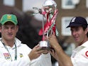 South African captain Graeme Smith (L) and England's captain Michael Vaughan jointly lift the Test series trophy, 08 September 2003