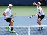 Jamie Murray of Great Britain and John Peers of Australia return a shot to Bjorn Fratangelo and Dennis Novikov of the USA during their Men's Doubles First Round Match on Day Three of the 2015 US Open at the USTA Billie Jean King National Tennis Center on 